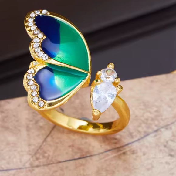 Anthropologie Gold Ring with Blue and White Butterfly Design - Picture 3 of 7